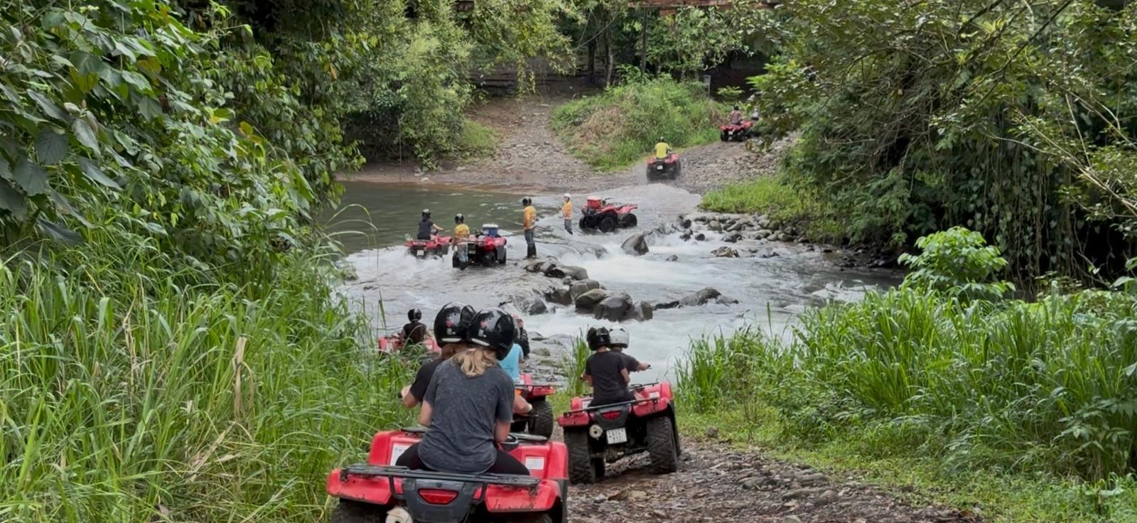 ATVs lining up for a river crossing in Costa Rica